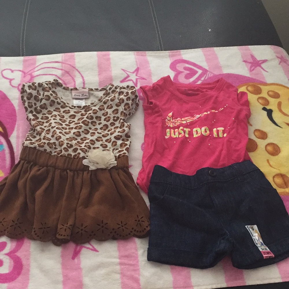 Nike pink shirt & free Garanimal Shorts & shirt